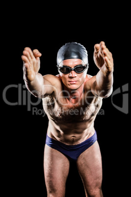 Swimmer preparing to dive