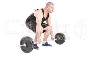 Bodybuilder lifting heavy barbell weights