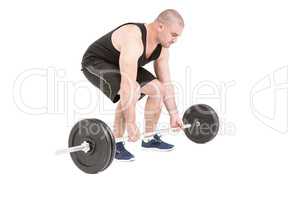 Bodybuilder lifting heavy barbell weights