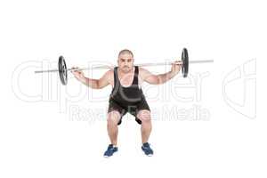 Bodybuilder lifting heavy barbell weights