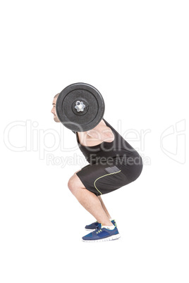 Bodybuilder lifting heavy barbell weights