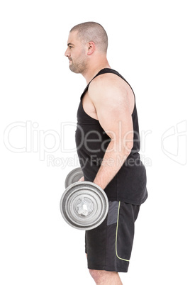 Bodybuilder lifting heavy barbell weights