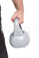 Bodybuilder lifting heavy kettlebell
