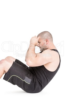 Athlete in sportswear doing crunches