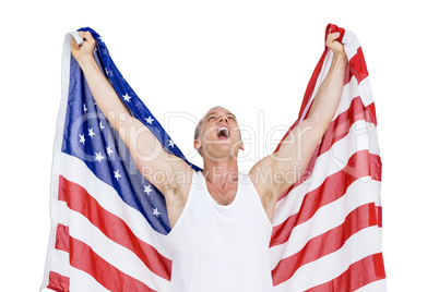 Athlete posing with american flag after victory