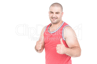 Athlete posing and giving a thumbs up