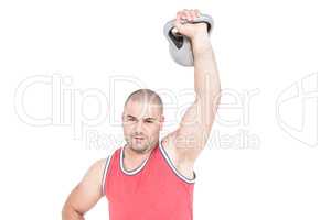 Bodybuilder lifting heavy kettlebell