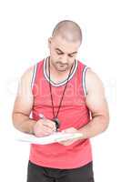 Athlete writing on clipboard