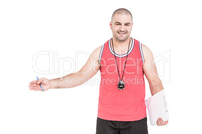 Athlete posing with sport timer and a clipboard