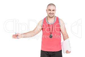 Athlete posing with sport timer and a clipboard