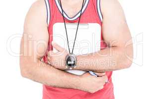 Athlete with sport timer and clipboard