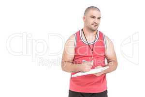 Athlete writing on clipboard