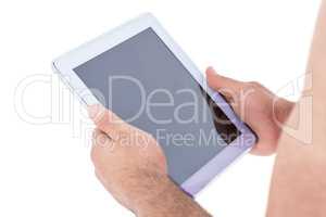 Close-up of hand holding using digital tablet