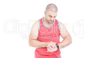 Athlete checking time on wristwatch