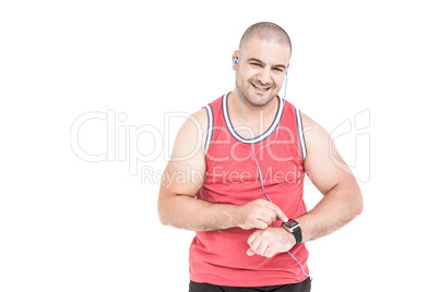 Athlete checking time on wristwatch