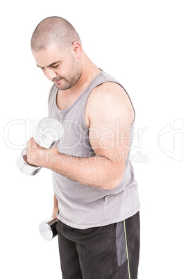 Athlete working out with dumbbells Athlete working out with dumbbells