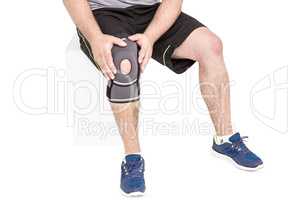 Athlete wearing knee pad