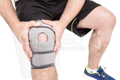 Athlete wearing knee pad