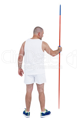 Athlete standing with javelin