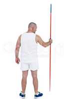 Athlete standing with javelin