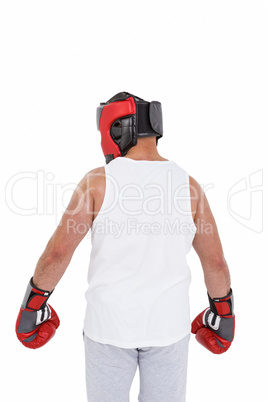 Boxer wearing head protector and gloves