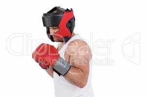 Boxer wearing head protector and gloves