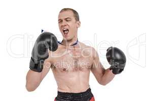 Boxer wearing medal performing boxing stance