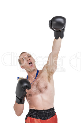 Boxer wearing gold medal performing boxing stance
