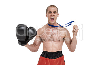 Happy boxer showing his silver medal