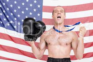 Excited boxer showing his gold medal