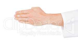 Karate player making hand gesture on white background