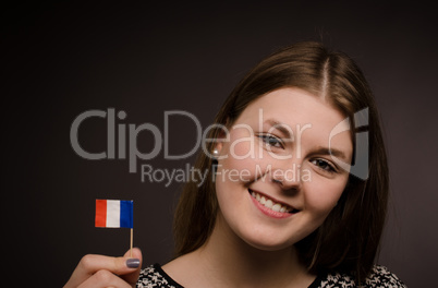 Beautiful woman with a French flag