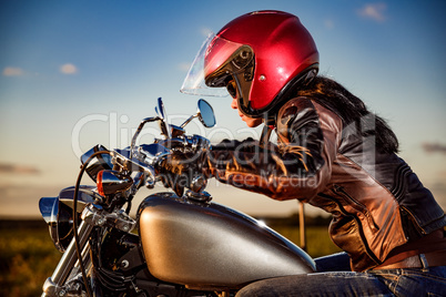 Biker girl on a motorcycle