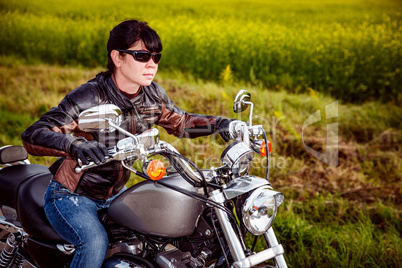 Biker girl on a motorcycle