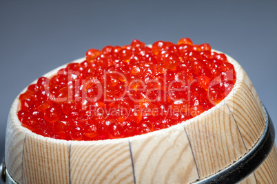 Keg of red caviar