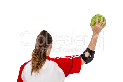 Sportswoman holding a ball