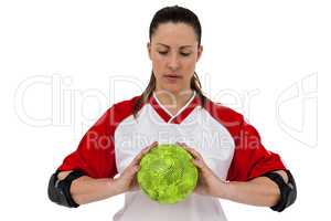 Sportswoman holding a ball