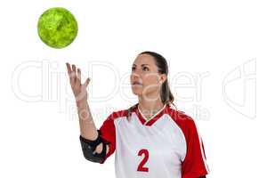 Sportswoman playing with ball
