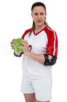 Sportswoman holding a ball