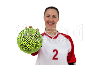 Sportswoman holding a ball