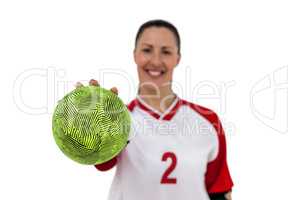 Sportswoman holding a ball