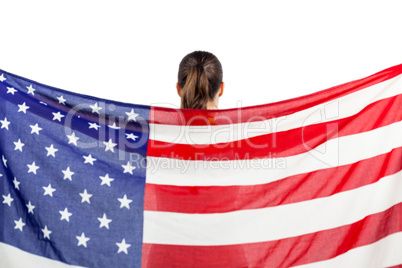 Athlete posing with american flag after victory