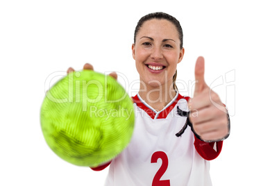 Sportswoman holding a ball