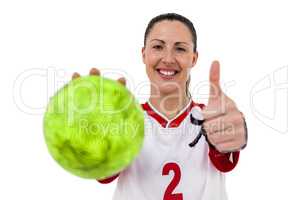 Sportswoman holding a ball