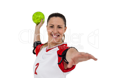 Sportswoman throwing a ball