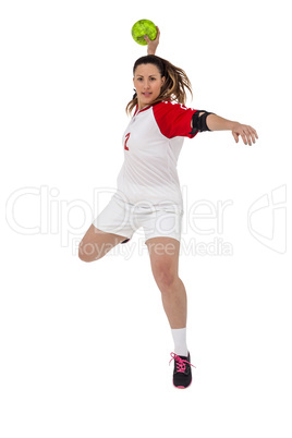 Sportswoman throwing a ball