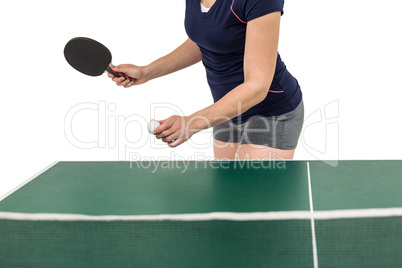 Female athlete playing table tennis