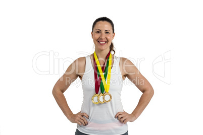 Athlete posing with gold medals around his neck