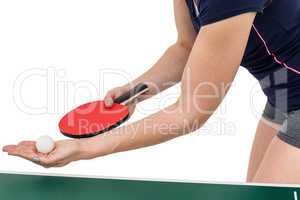 Female athlete playing table tennis