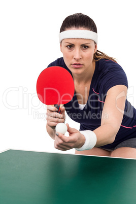 Female athlete playing table tennis